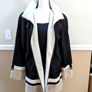 Beautiful Woman's Jones of New York color blocked under the knee hooded jacket.